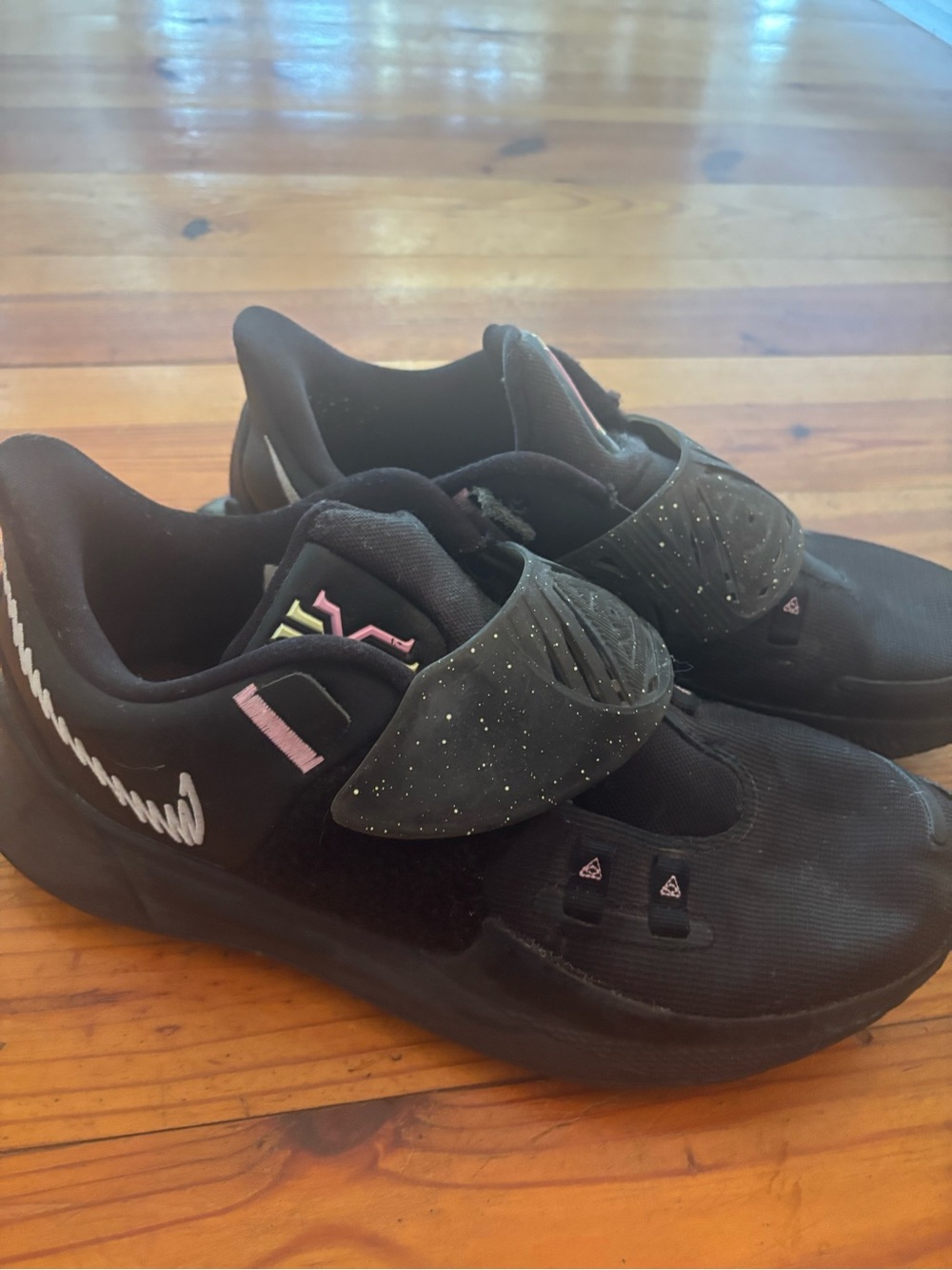Nike Black Sneakers with Pink Details